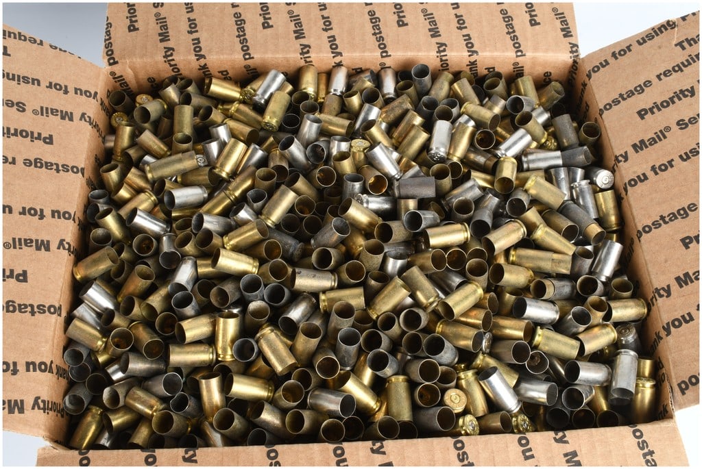 28 Lbs of Empty .40 S&W Brass Casings: A collection of once fired .40 S&W brass casings, including both brass and nickel-plated brass components. These empty shells are unprocessed and uncleaned, featuring various manufacturer headstamps s