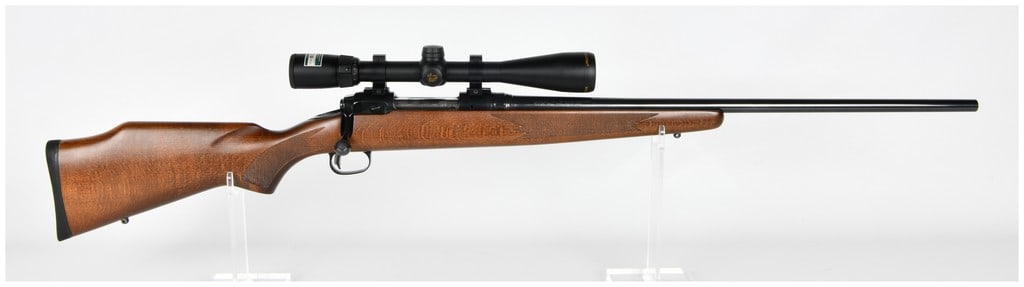 Savage Model 10 Bolt Action Rifle in .300 WSM with Mounted Nikon Buckmasters BDC Scope (Modern): The lot consists of a Savage Arms Model 10 bolt-action sporting rifle chambered in the powerful .300 Winchester Short Magnum (.300 WSM) caliber, complete with a mounted telescopic sight. The rifle fea