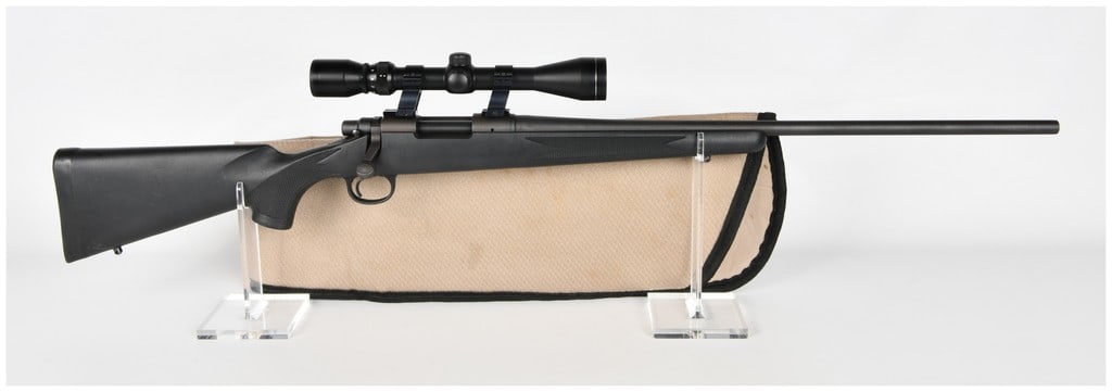 Remington Model 700 Bolt-Action Rifle in .204 Ruger with Tasco Scope, Modern Production: The lot consists of a Remington Model 700 bolt-action rifle, a mounted Tasco scope, and a padded textile rifle bag. The rifle is chambered in the high-velocity .204 Ruger caliber. The rifle features a