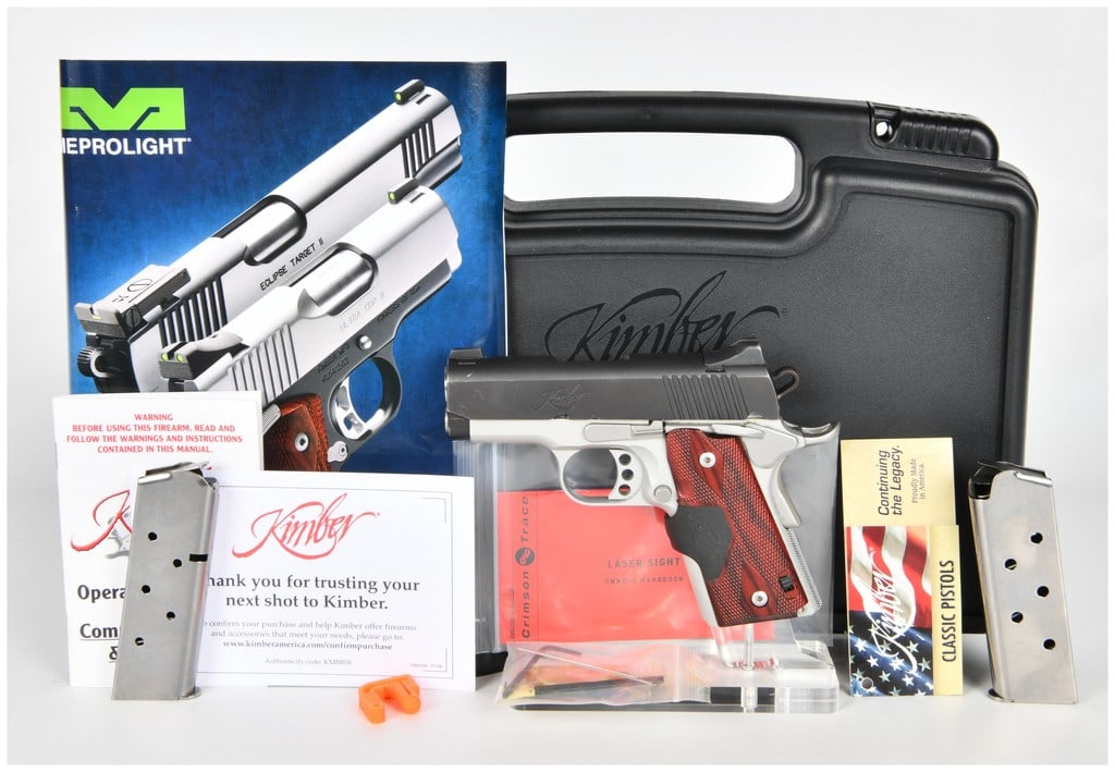 Kimber Ultra Crimson Carry II .45 ACP Semi-Automatic Pistol with Crimson Trace Grips, Serial: This lot features a Kimber Ultra Crimson Carry II semi-automatic pistol chambered in .45 ACP, manufactured by Kimber Mfg. in Yonkers, New York. This compact 1911-style firearm is characterized by its