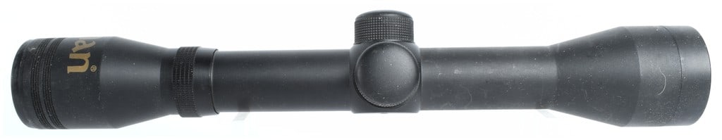 Beeman 4x32 Fixed Power Rifle Scope, Matte Black Finish, circa 1990s: This Beeman brand fixed-power rifle scope is constructed of metal with a matte black finish, designed primarily for use with air rifles or small-bore firearms. The ocular bell features the Beeman