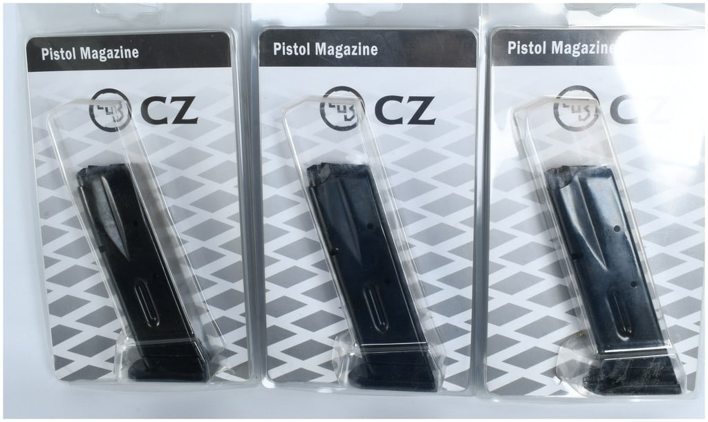 Three CZ 75 Compact 9mm 10-Round Magazines: Three CZ 75 Compact 9mm 10-round magazines manufactured by Ceska zbrojovka (CZ). Each magazine is constructed of blued steel with a black polymer floor plate. The items are presented in their original
