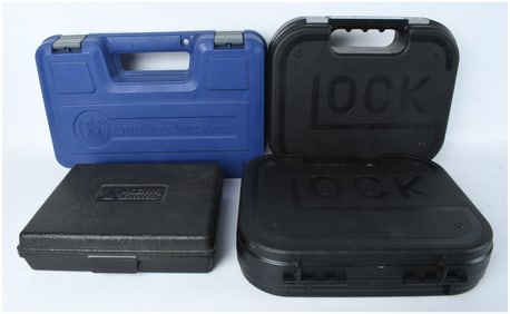 A Collection of Smith & Wesson, Glock, and Kahr Arms Handgun Cases
