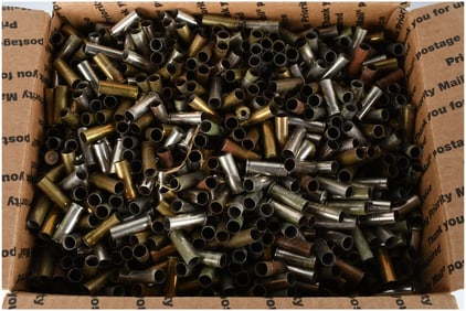 An Assortment of Spent Brass and Nickel-Plated Handgun Ammunition Shell Casings