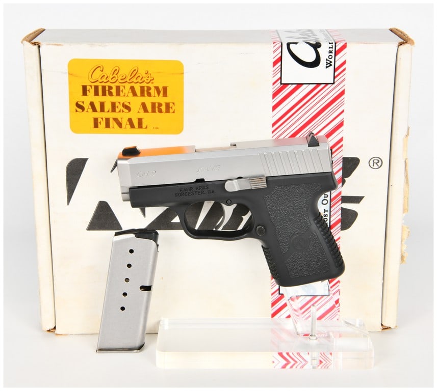 Kahr Arms CM9 Semi-Automatic Pistol, 9mm Luger, Stainless and Polymer, circa 2011-2015: This Kahr Arms CM9 is a compact, striker-fired semi-automatic pistol chambered for the 9x19mm (9mm Luger) cartridge. Designed for concealed carry, the firearm features a 3-inch barrel and a