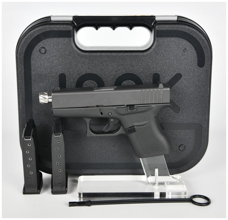 Glock Model 43 Semi-Automatic 9mm Pistol with Threaded Barrel and Case, c. 2015-Present: This lot features a Glock Model 43 semi-automatic striker-fired pistol chambered in 9x19mm. Manufactured in Austria, this subcompact firearm is built on a black polymer frame with a matte-finish