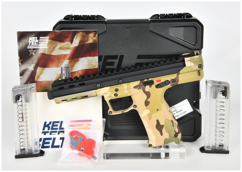 Kel-Tec CP33 Semi-Automatic Pistol in Green Multicam Finish, c. 2019-Present: A Kel-Tec CP33 semi-automatic competition pistol chambered in .22 LR. This firearm features a lightweight polymer frame with a factory-applied "Green Multicam" camouflage finish and a contrasting