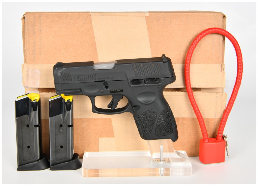 Taurus G3c 9x19mm Semi-Automatic Pistol with Two Magazines, c. 2020-Present: This lot features a Taurus G3c semi-automatic striker-fired pistol chambered in 9x19mm. Manufactured by Taurus Armas in Brazil and imported through Bainbridge, Georgia, this compact firearm is a moder