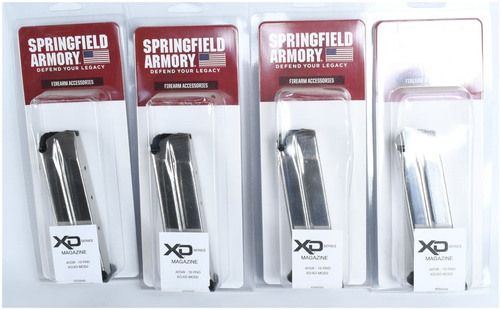 Four Springfield Armory XD Series 40 S&W 10 Round Magazines: A group of 4 Springfield Armory XD Series firearm magazines designed for .40 S&W caliber XD and XD Mod.2 models. Each magazine features a 10-round capacity and is constructed with a polished stainless