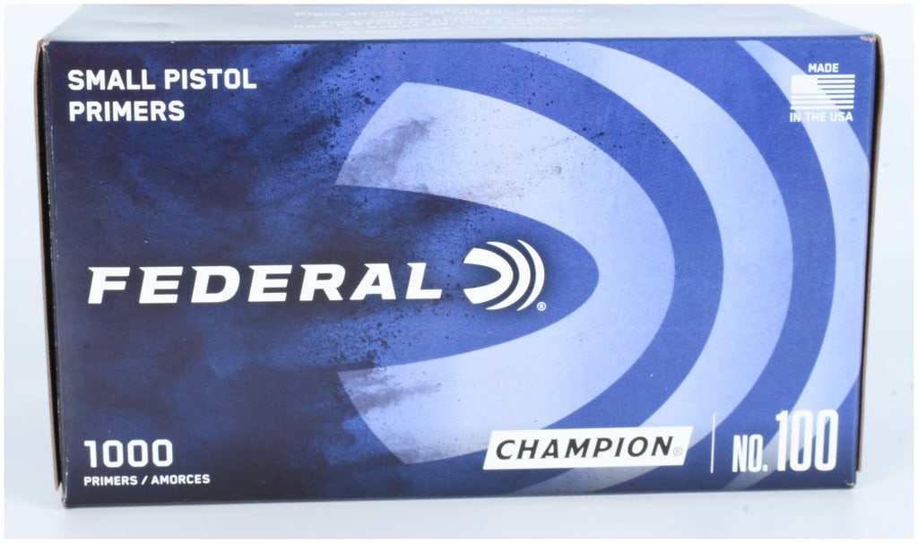 Federal Champion Small Pistol Primers No. 100: Federal Champion Small Pistol Primers No. 100. This item consists of a factory box containing 1000 centerfire primers. The blue and white cardboard packaging features the Federal brand name and logo a