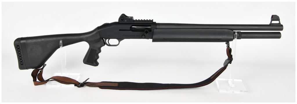 Mossberg Model 930 Semi-Automatic Tactical Shotgun with 18.5 Inch Barrel, Modern Production: A modern production Mossberg Model 930 semi-automatic shotgun, chambered for 12 Gauge 2 3/4 inch and 3 inch shells. The firearm features a black finish throughout and is equipped with black synthetic
