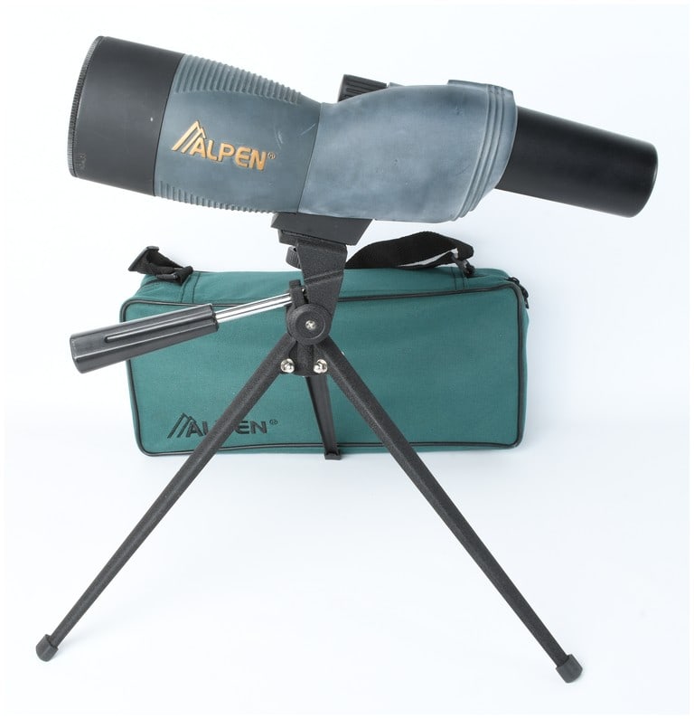 Alpen Shasta Ridge Waterproof Spotting Scope with Tripod and Case: This Alpen Shasta Ridge waterproof spotting scope features a gray and black composite body with the brand name ALPEN in gold-toned lettering on the side. The optical instrument is equipped with a top-