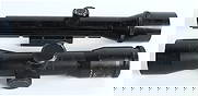 Bushnell Magnum Phantom 1.3X and Chinese 2.5X Vintage Rifle Scopes, Lot of 2, circa 1970s: This lot features two vintage telescopic sights designed for firearm use. The first is a Bushnell Magnum Phantom 1.3X scope, a model historically recognized for its long eye relief, making it suitable