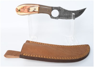 A Hand Forged Damascus Steel Skinning Knife with Leather Sheath