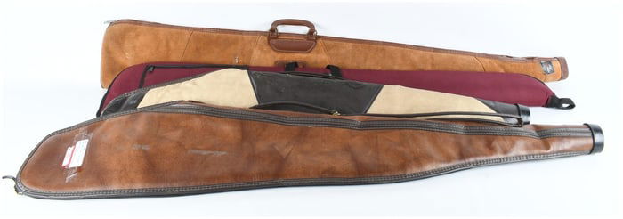 A Group of Four Soft Rifle Cases including Red Head