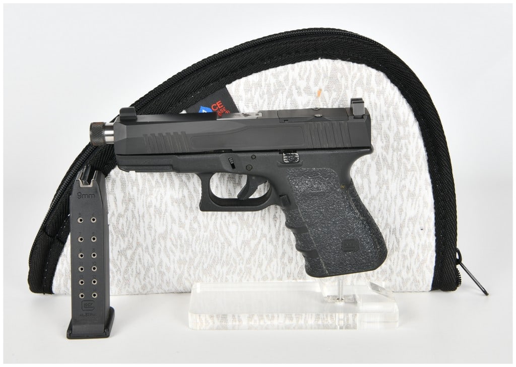 Glock Custom Model 19 9mm Semi-Automatic Pistol with Lone Wolf Threaded Barrel, c. 2010-2020: This lot features a customized 9mm semi-automatic pistol built on a Glock polymer frame. The frame is an Austrian-manufactured Glock component, marked MADE IN AUSTRIA GLOCK, INC., SMYRNA, GA. and carr