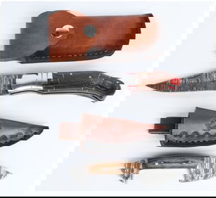 A Pair of Damascus Steel Knives with Leather Sheaths