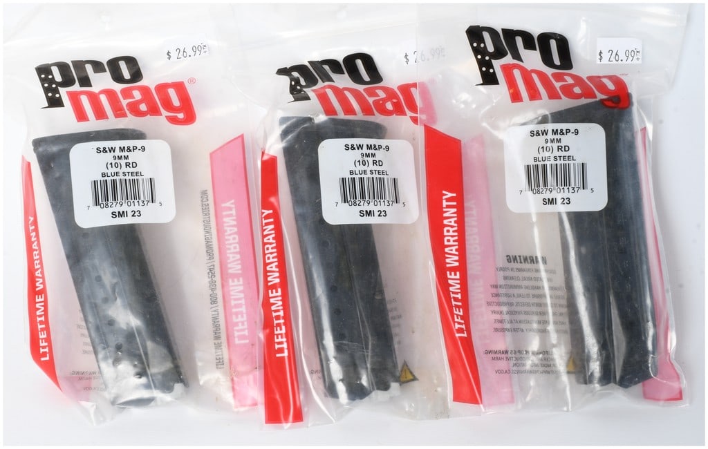 A Trio of ProMag SMI23 Smith & Wesson M&P9 10-Round 9mm Blue Steel Magazines: A trio of ProMag replacement magazines designed for the Smith & Wesson M&P-9 pistol. Each magazine is constructed from heat-treated blued steel with a 10-round capacity for 9mm Luger ammunition. The