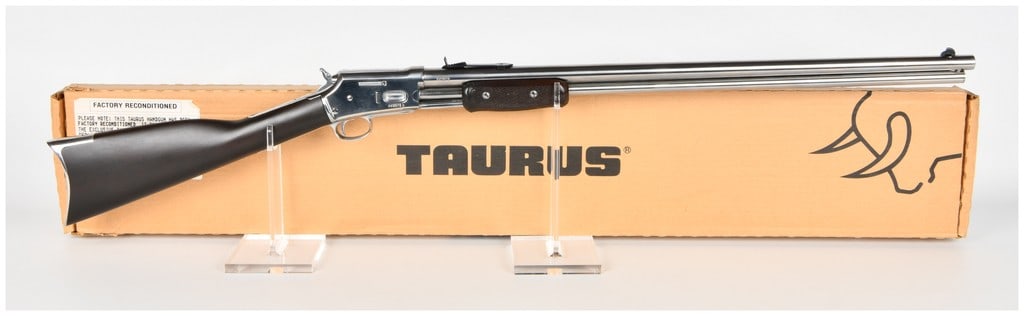 Taurus Model C45 Thunderbolt Pump Action Rifle in Polished Stainless Steel .45 Colt: A modern production Taurus Model C45 Thunderbolt pump action rifle chambered in the popular .45 Colt (.45 LC) cartridge. This rifle is a reproduction of the classic Colt Lightning slide-action rifle,