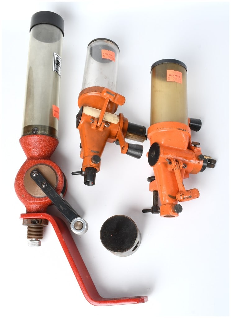 Lyman Ideal No. 55 and Vintage Powder Measures Lot of Three Reloading Tools: This lot features three vintage powder measures manufactured by Lyman Ideal, highly sought after by ammunition reloaders and collectors for their robust cast metal construction and reliable volumetric