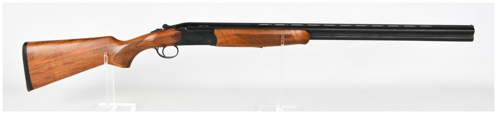 TriStar Over/Under Break Action Shotgun 28 Gauge with 28 Inch Barrel: This is a single over/under break-action shotgun chambered in 28 gauge with 2 3/4-inch chambers. The firearm features blued barrels with a ventilated rib and a single brass-tone front bead sight. The