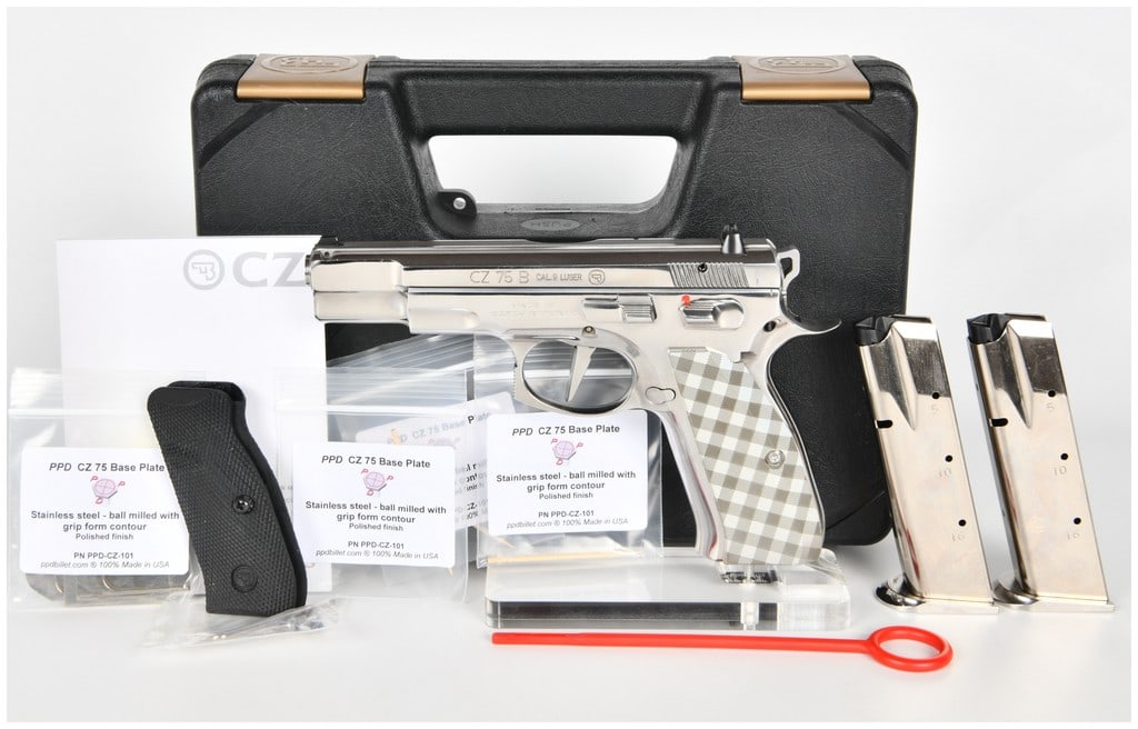 CZ 75 B Semi-Automatic Pistol 9mm Luger with 4.6 Inch Barrel 2019: This lot features a CZ 75 B semi-automatic pistol chambered in 9mm Luger, manufactured in 2019. The firearm is equipped with a 4.6-inch barrel and features a striking high-polish stainless steel finis
