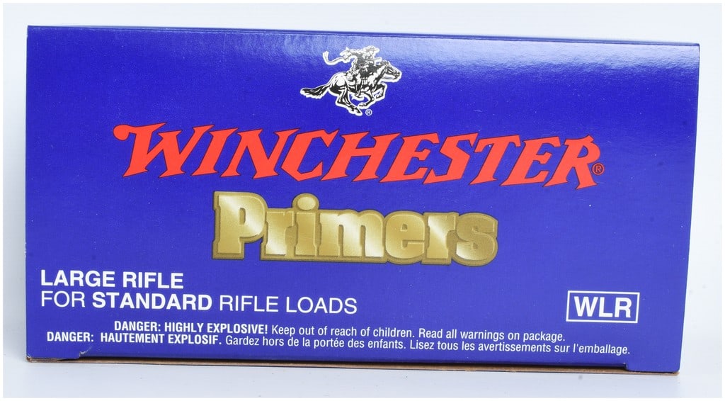 1000 Count Winchester Large Rifle Primers WLR: Winchester Large Rifle Primers (WLR) designed for standard rifle loads. This lot consists of 1000 primers. The primers are brass-colored and are housed in black plastic trays within blue cardboard sle