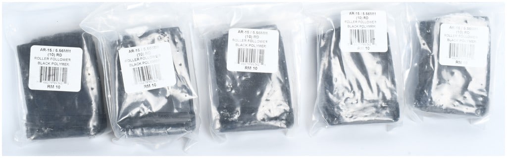 A Lot of 5 ProMag RM 10 AR-15 Magazines 5.56mm: A lot of five individually packaged magazines designed for the AR-15 rifle platform chambered in 5.56mm. These magazines feature a 10-round capacity and are constructed from durable black polymer