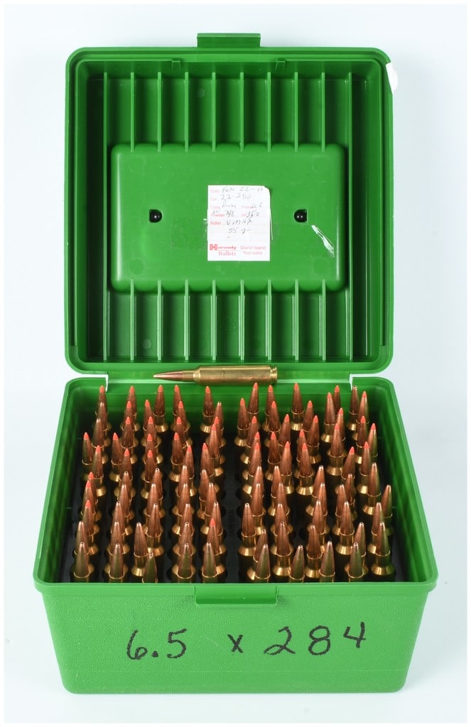 A Lot of 100 Rounds of Hornady 6.5-284 Ammunition with R-100 Series Container: This lot consists of 100 rounds of 6.5-284 caliber centerfire rifle ammunition featuring high-quality Hornady brass cases. The collection includes two distinct projectile types, including rounds with
