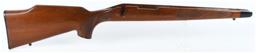 Remington 700 BDL Short Action Rifle Stock: This Remington 700 BDL short action rifle stock is designed for a bolt-action configuration and is compatible with short action calibers. Crafted from a stained hardwood with a high-gloss finish, the