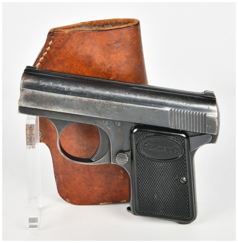 Browning Baby Browning Semi-Automatic Pistol .25 ACP with 2 Inch Barrel: This Belgian-manufactured semi-automatic pocket pistol is chambered in 6.35mm, also known as .25 ACP, and features a fixed barrel approximately 2 inches in length. The firearm is constructed of blued