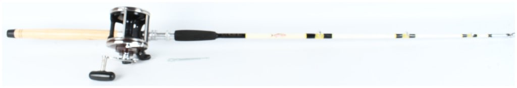 Penn Senator High Speed 114H2 Conventional Reel and Ivy's Tackle Box Trolling Rod: This deep-sea trolling outfit consists of a Penn Senator High Speed 114H2 conventional reel mounted on a rod marked Ivys Tackle Box in gold-tone script. The reel is constructed with a chrome-plated fr
