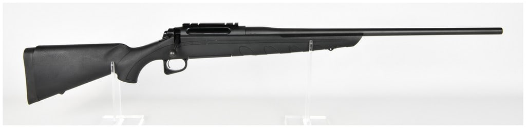 Remington Model 770 Bolt Action Rifle .300 Win Mag: This Remington Model 770 is a bolt-action rifle chambered in .300 Win Mag, designed for reliable performance in the field. The rifle features a matte black finish on the barrel and receiver, with the