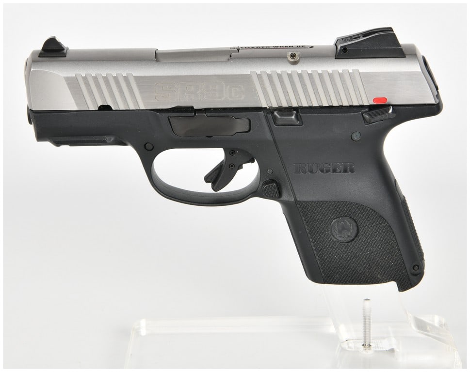 Ruger SR9c Semi-Automatic Pistol 9mm with 3.4 Inch Barrel: This Ruger SR9c is a compact semi-automatic pistol chambered for the 9mmx19 cartridge, featuring a 3.4-inch barrel and a striker-fired action. The firearm is configured with a two-tone finish consisti