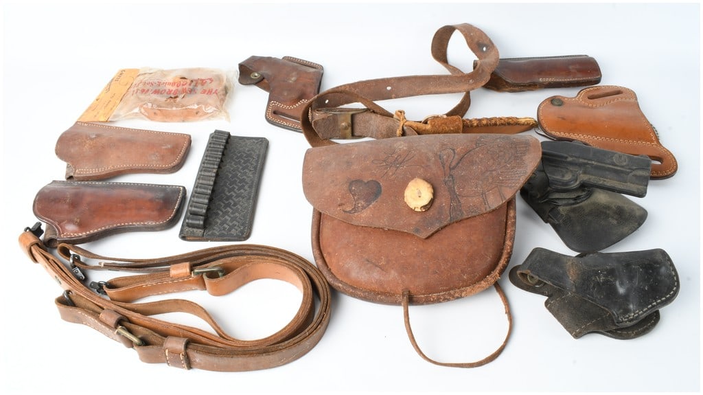 An Assortment of Leather and Synthetic Firearm Accessories Including Slings Holsters and a Hunting (1 of 5)