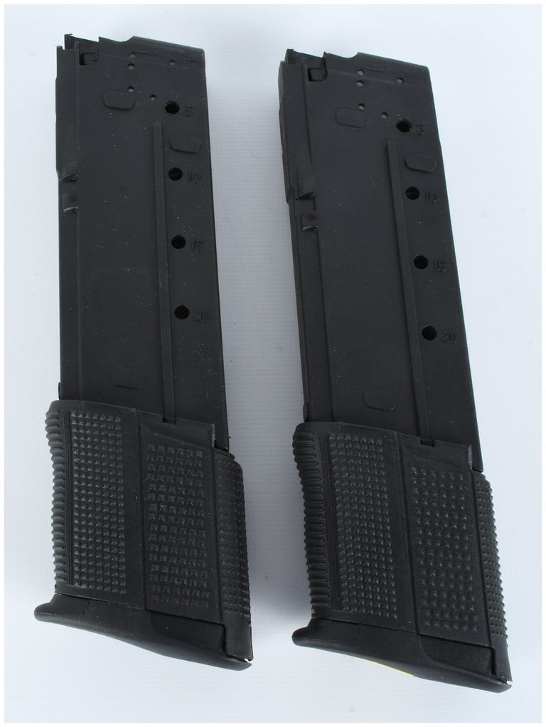 A Pair of 20-Round Polymer Pistol Magazines: This lot consists of a pair of black polymer pistol magazines designed for high-capacity use. Each magazine features a 20-round capacity and is constructed from a durable black synthetic material. The