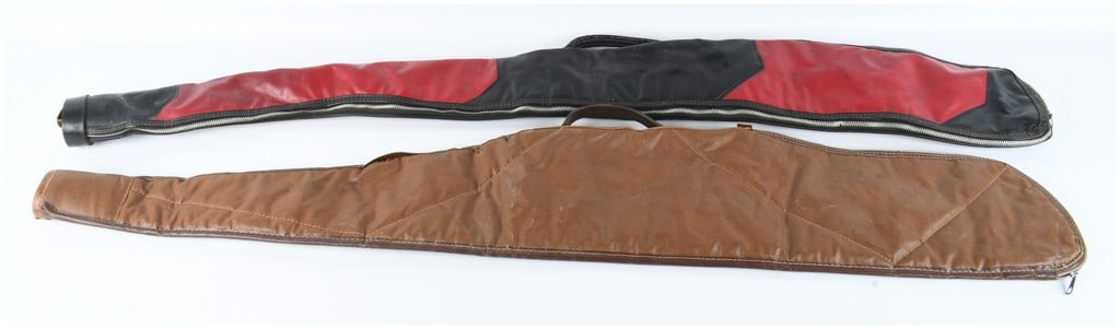 A Pair of Soft Sided Rifle Cases including a BAT Branded Example: This lot consists of a pair of soft-sided long gun cases designed for rifles or shotguns. The first case is constructed from a red and black synthetic material featuring a side-mounted zipper, a black