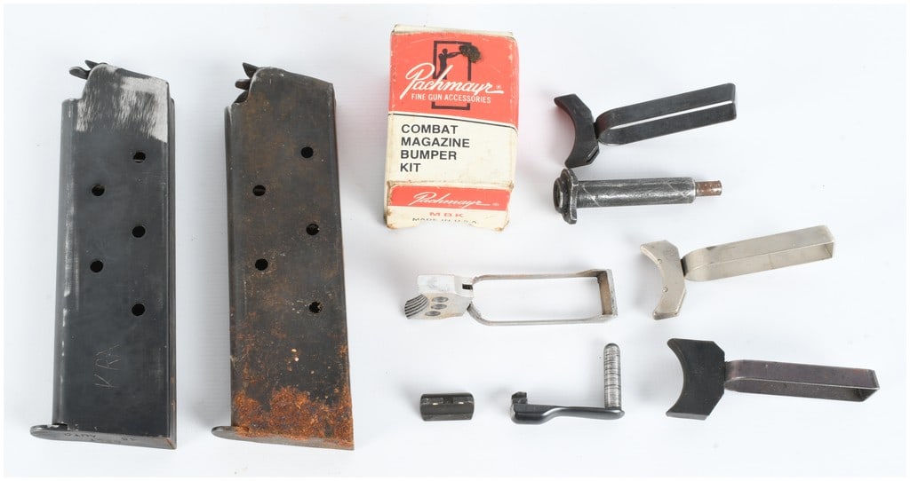 A Collection of 10 Model 1911 Pistol Parts and Accessories including Colt Magazines (1 of 4)