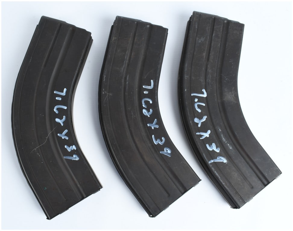 Trio of C Products LLC AR-15 Rifle Magazines 7.62x39mm: This lot features three metal magazines produced by C Products LLC for AR-15 platform rifles chambered in 7.62x39mm. These magazines are manufactured from stainless steel with a durable dark matte fin