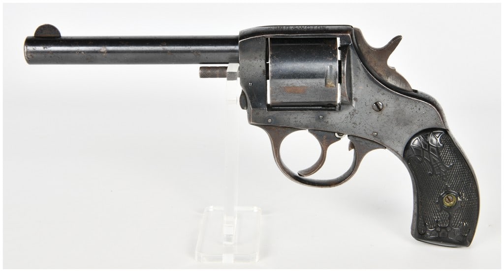 H. & R. Arms Co. Victor Double Action Revolver .38 S&W: This solid-frame, double-action revolver is chambered for the .38 Smith & Wesson cartridge and was manufactured by the H. & R. Arms Co. of Worcester, Massachusetts. The firearm is equipped with a roun