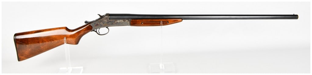 Montgomery Ward Hercules Break Action Single Shot Shotgun 12 Gauge: This is a single-shot break-action shotgun chambered for 12-gauge shells, produced for the retailer Montgomery Ward under the Hercules model name. The firearm is configured with a single blued barrel