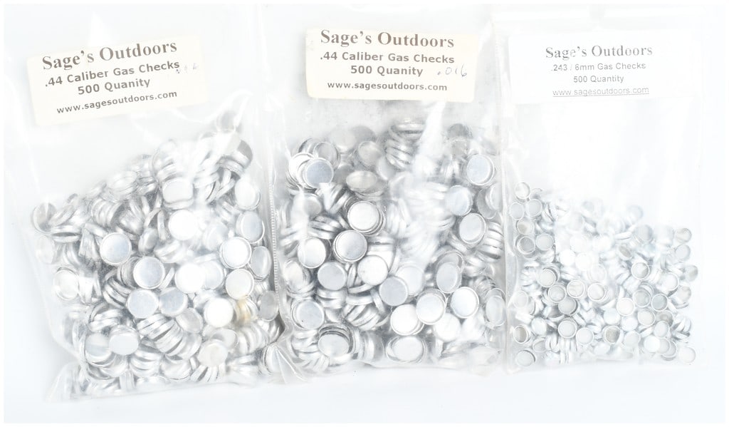 A Trio of Sage's Outdoors Aluminum Gas Checks .44 and .243 Caliber: This lot consists of a trio of bulk-packaged ammunition reloading components manufactured by Sage?s Outdoors, specifically designed for cast lead bullet applications. The collection includes two bags