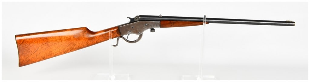 Stevens Crack Shot-26 Lever Action Rifle .22 Long Rifle: This Stevens Crack Shot-26 is a single-shot lever-action rifle chambered for the .22 Long Rifle cartridge. The firearm features a round barrel paired with a smooth wood stock and forend that have been