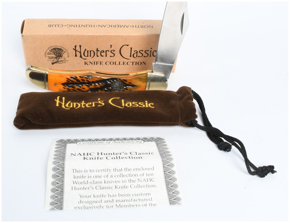 NAHC Hunter's Classic Folding Hunter Pocket Knife H1730: This North American Hunting Club (NAHC) folding pocket knife is model H1730 from the Hunter's Classic Knife Collection. The knife features a single stainless steel clip point blade with a nail nick fo