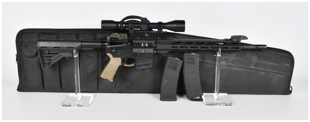 Anderson Manufacturing AM-15 Semi-Automatic Rifle 5.56 NATO with 16 Inch Barrel: This Anderson Manufacturing AM-15 is a semi-automatic rifle chambered in 5.56 NATO, configured as a versatile modern sporting platform. The firearm features a 16 inch barrel with a 1:8 twist rate and