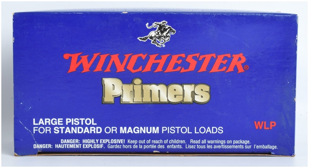 Winchester WLP Large Pistol Primers 1000 Count: This lot features 1000 Winchester Large Pistol Primers (WLP) suitable for standard or magnum pistol loads. The primers are contained in a blue cardboard sleeve with a black plastic internal tray syste