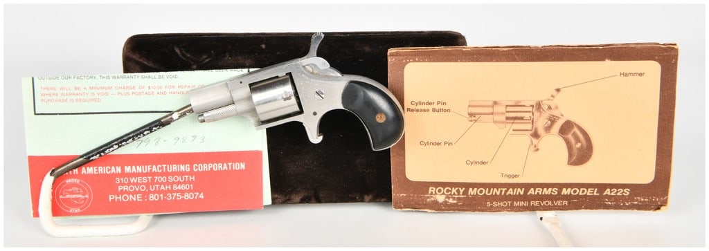 Rocky Mountain Arms Casull Model A22S Single Action Mini Revolver .22 Short with 1.125 Inch Barrel: This lot features a single action 5-shot mini revolver manufactured by Rocky Mountain Arms Corp., identified as the Casull Model A22S and chambered in .22 Short. The firearm is constructed with a brus