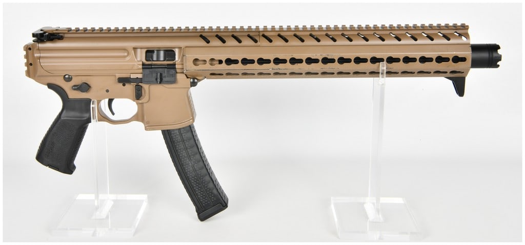 Sig Sauer MPX Semi-Automatic Rifle 9mm with 16 Inch Barrel: This Sig Sauer MPX semi-automatic rifle is chambered in 9mm and features a Flat Dark Earth finish on the upper and lower receivers. The firearm is equipped with an extended KeyMod handguard in a match