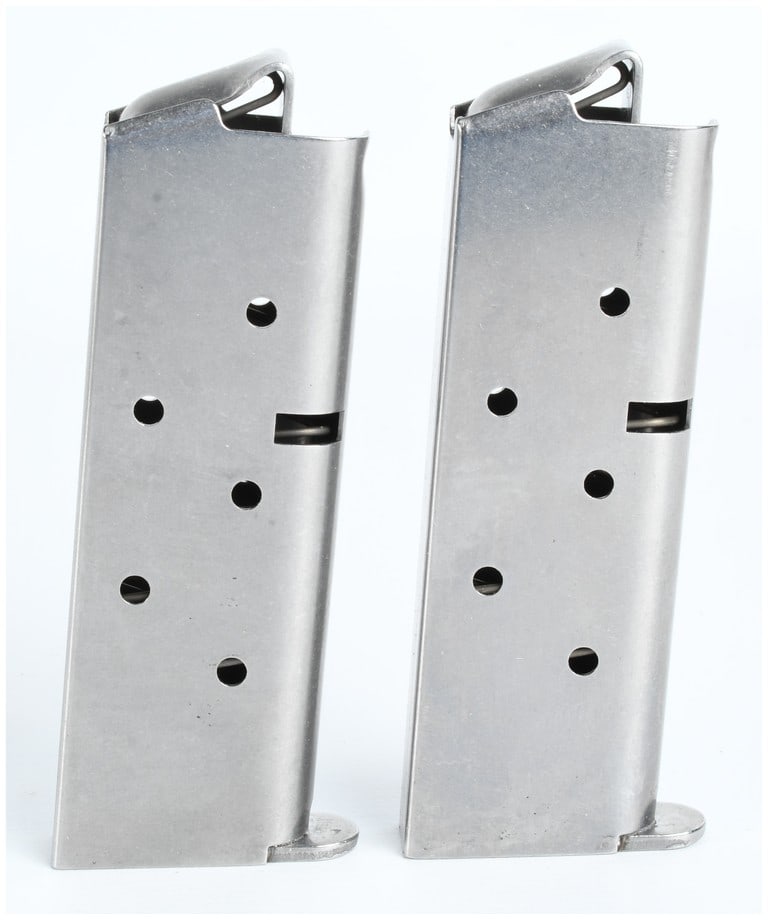 A Pair of Colt .380 Caliber Stainless Steel Magazines: This lot consists of two factory Colt semi-automatic pistol magazines chambered in .380 caliber. Each magazine is constructed from polished stainless steel and features five staggered indicator holes