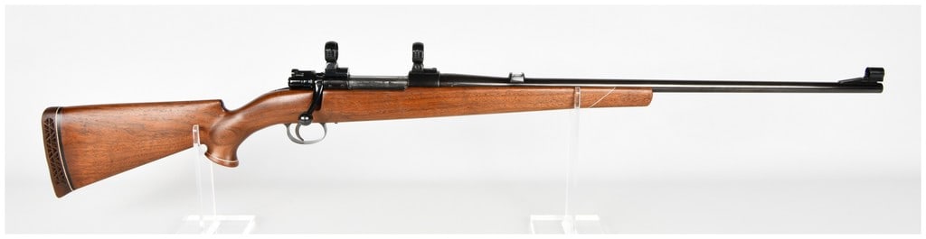 Sako L61R Finnbear Bolt Action Rifle .300 Magnum: This Sako L61R Finnbear is a bolt-action sporting rifle chambered in .300 Magnum intended for big game hunting. The rifle features a blued barrel and receiver mounted in a one-piece walnut stock with